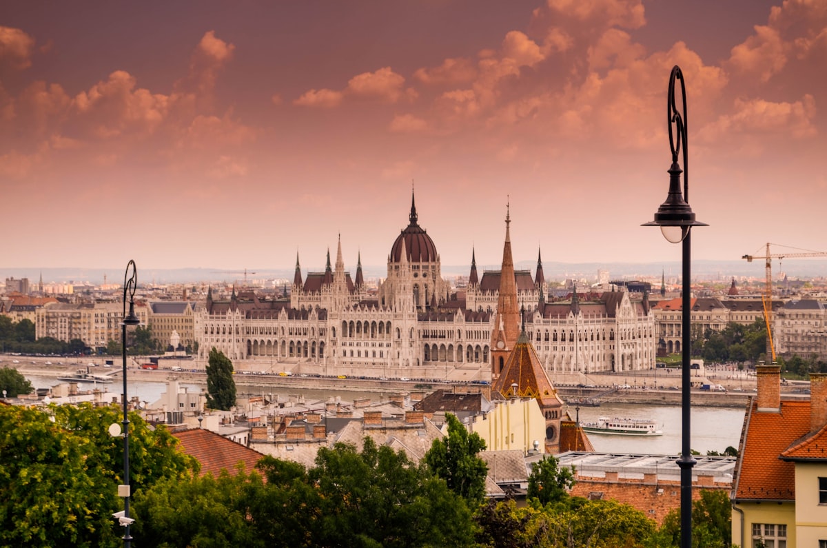 The Hungarian Parliament seen from the Castle District under a pink evening sky